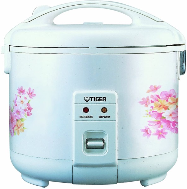 How do you cook rice in a mini rice cooker?
